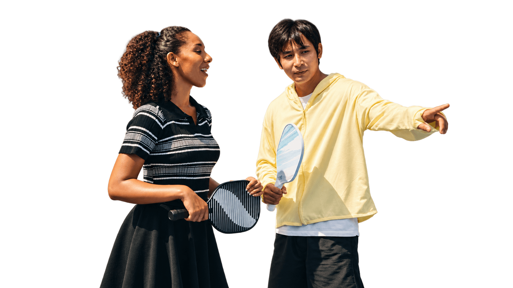 Two friends playing pickleball together